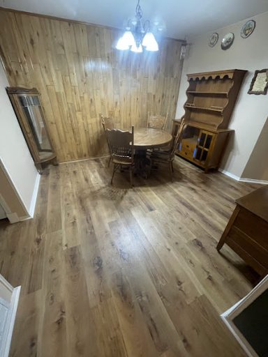New Laminate Flooring installation in dining room of San Angelo TX home.